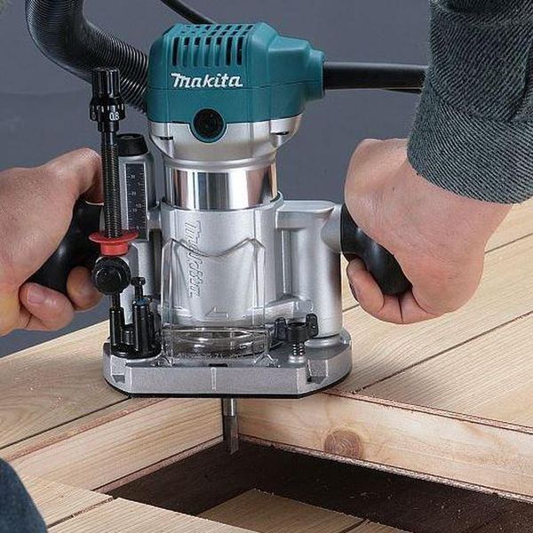 Електричний ручний столярний фрезер по дереву MAKITA RT0700CX2J : 710 Вт, 6-8 цанга, 30000 об/хв електрофрезер, 3 бази RT0700CX2J VSE фото