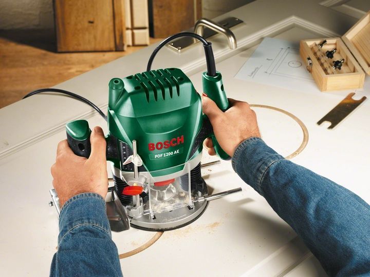 Професійний ручний столярний фрезер по дереву Bosch POF 1200 AE : 1200 Вт, 6-8 цанга, 28000 об/хв,електрофрезер (060326A100) 060326A100 VSE фото