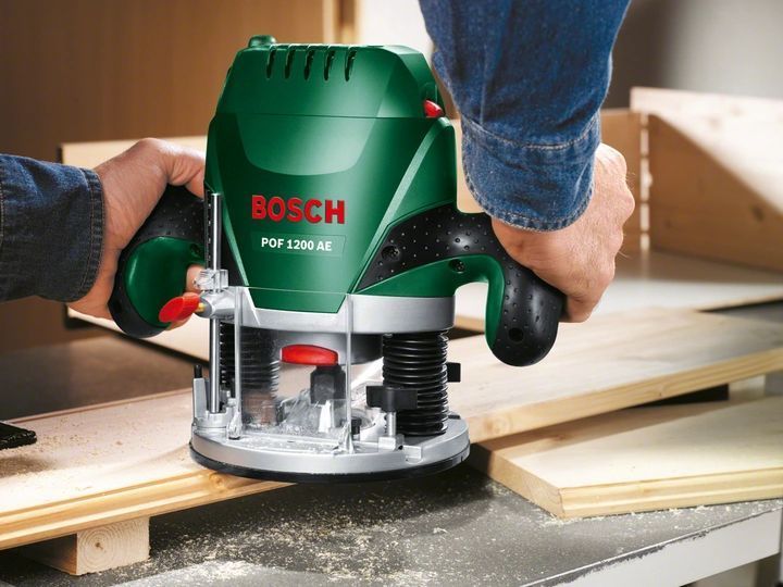 Професійний ручний столярний фрезер по дереву Bosch POF 1200 AE : 1200 Вт, 6-8 цанга, 28000 об/хв,електрофрезер (060326A100) 060326A100 VSE фото